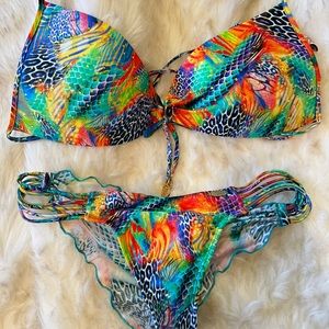 Luli Fama XLarge Top, Medium Bottoms. Rhinestone Detailing On The Too